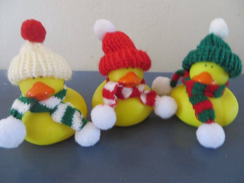 Winter ready rubber duckies - hats and scarves are attached to ducks