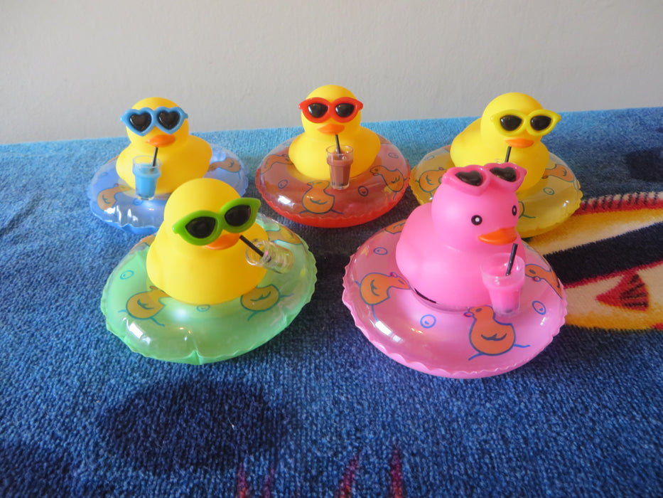 Rubber duckies on tubes - ready for the pool, drink in hand (I mean wing) - choice of color