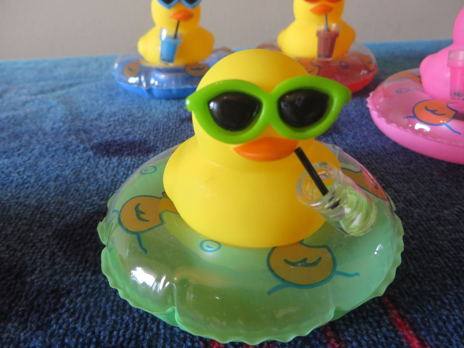 Rubber duckies on tubes - ready for the pool, drink in hand (I mean wing) - choice of color