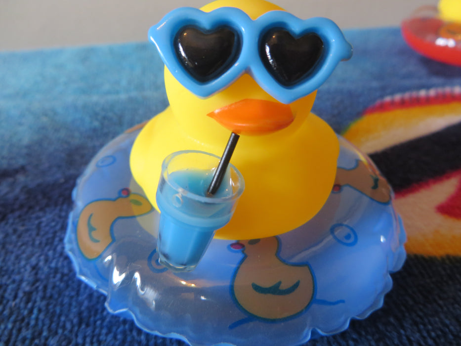 Rubber duckies on tubes - ready for the pool, drink in hand (I mean wing) - choice of color